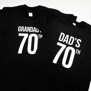 Photo of t-shirts with Granddad's and Dad's 70th birthday print